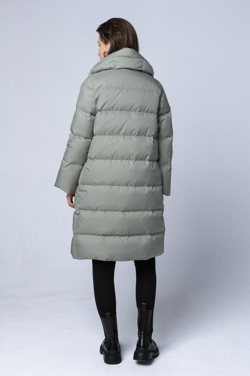 Longline down coat in a soft green color